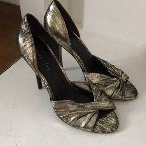 Elizabeth and James gold heels